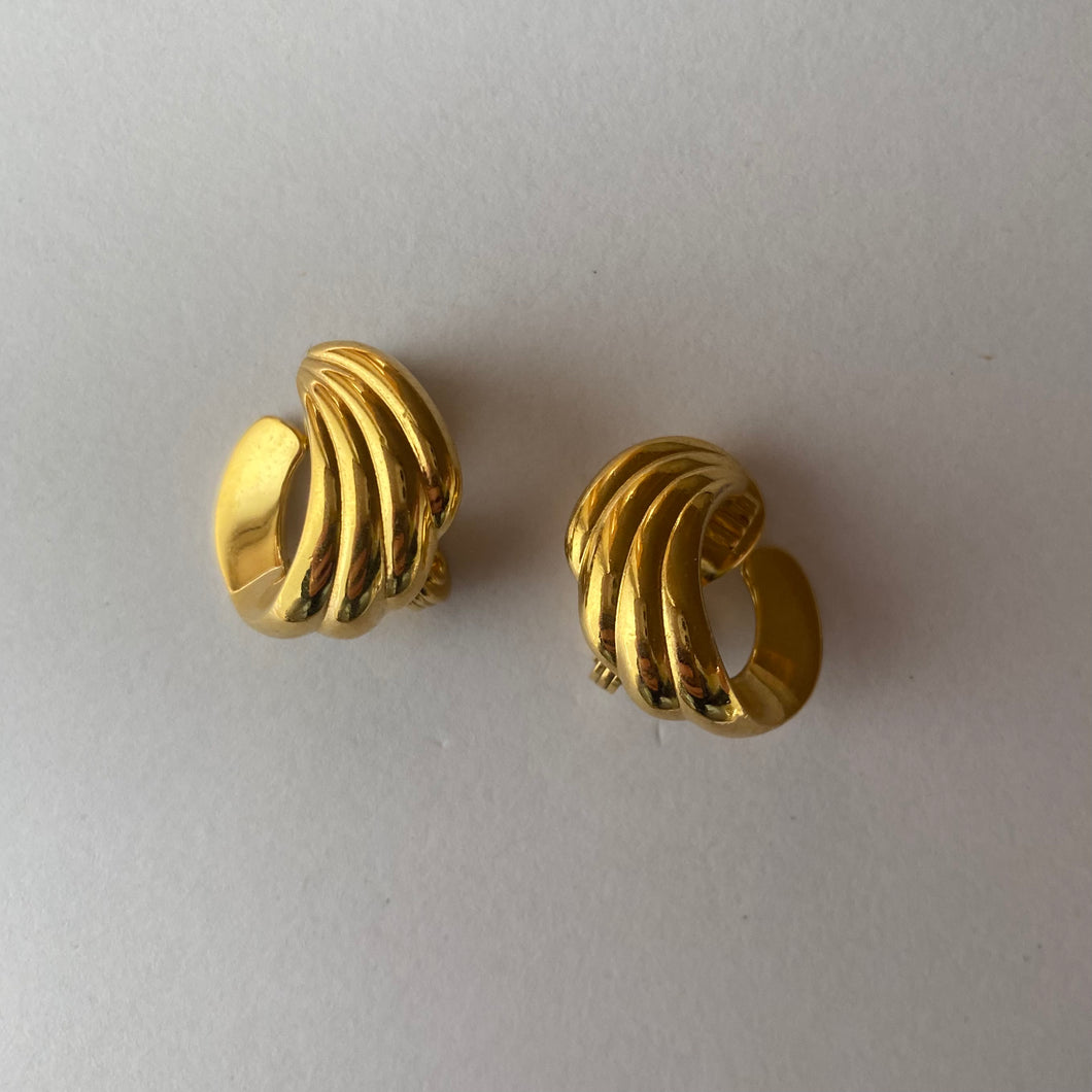 1980s Vintage Monet Gold Tone Circular Swirl Clip On Earrings